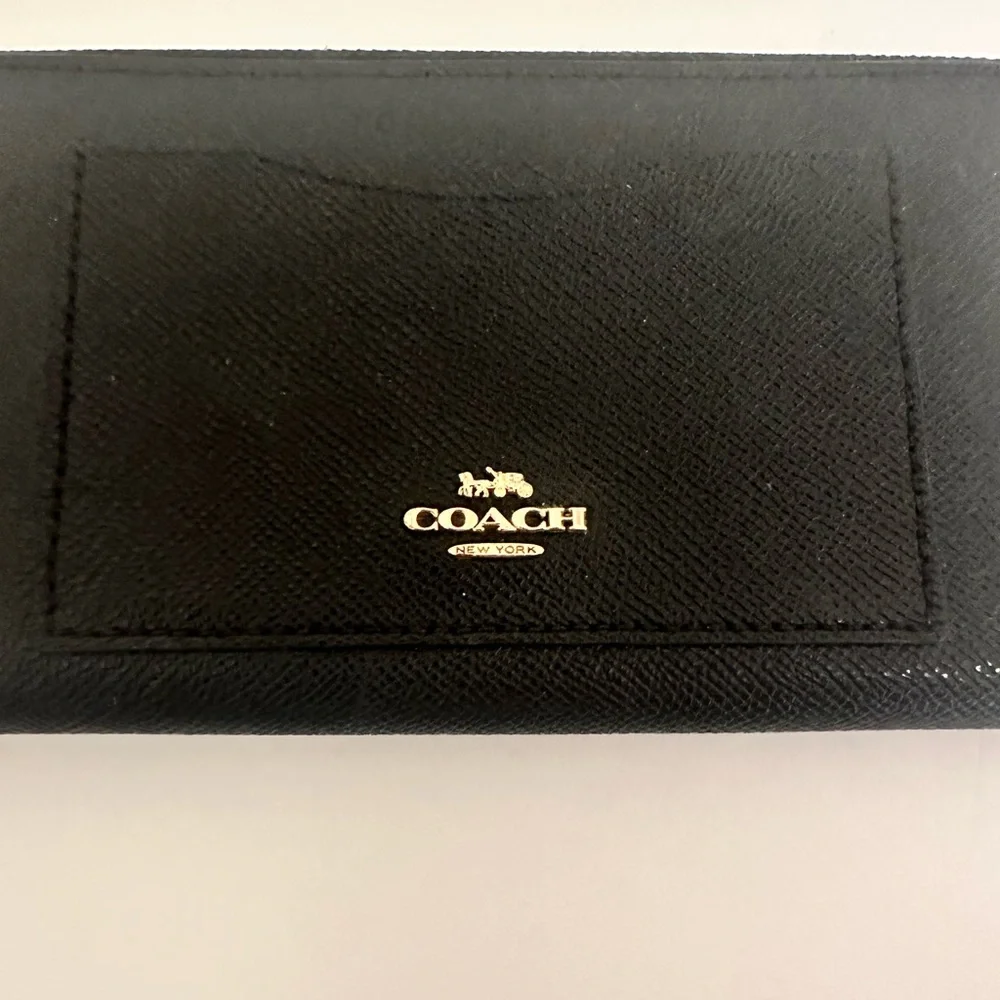 Coach accordion zip